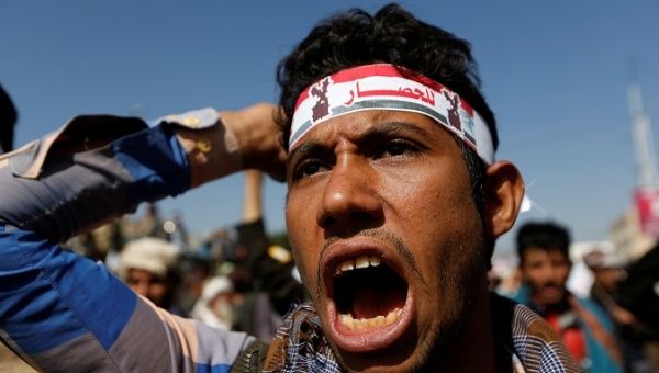 A supporter of the Houthi movement shouts slogans as he takes part in a demonstration against the closure of Yemen's ports by the Saudi-led coalition in Sanaa, Yemen November 13, 2017.