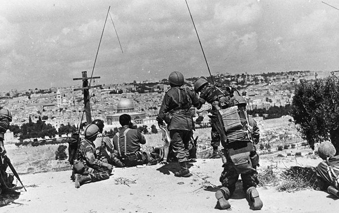 Israeli soldiers observe the compound known to Muslims as the Noble Sanctuary and to Jews as the Temple Mount, just prior to their attack on Jerusalem’s Old City, during the 1967 war.