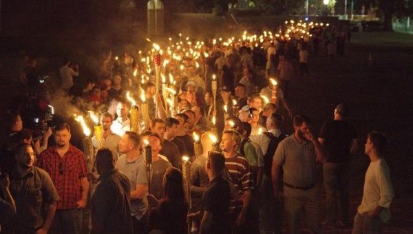 White nationalists carry torches on the grounds of the University of Virginia.