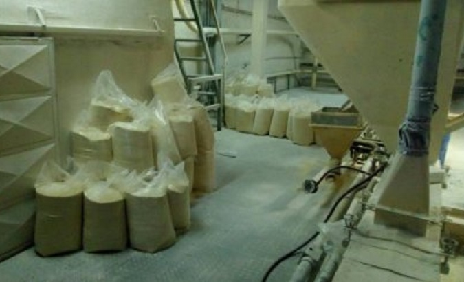 Bags of corn flour left to rot seen inside Demaseca's company plant in Venezuela.