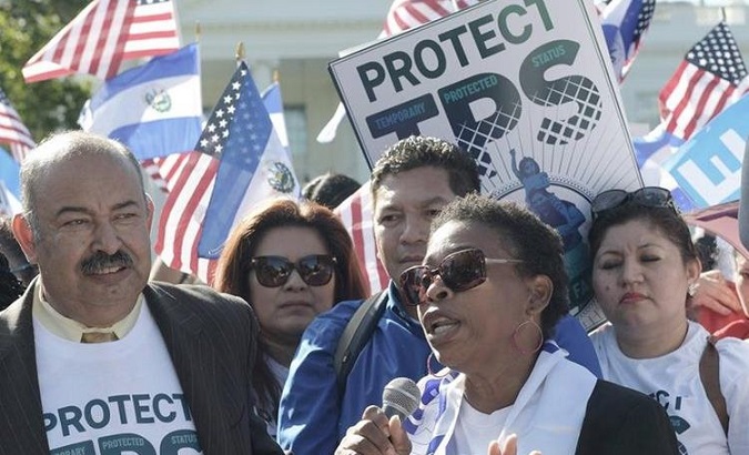 Honduran TPS recipient Martha Connor joins a rally in solidarity with Salvadoran TPS recipients in Washington, D.C.