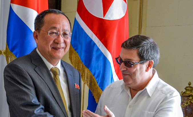 DPRK Foreign Minister Ri Yong Ho (L) meets Cuban Foreign Minister Bruno Rodriguez Parrilla (R).
