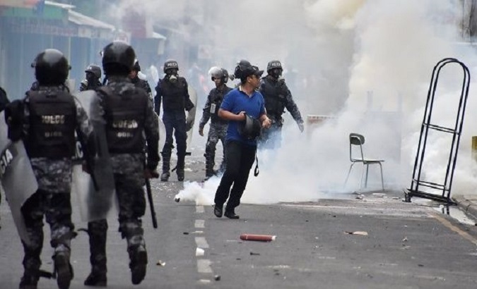 Police use tear gas against opposition protesters.
