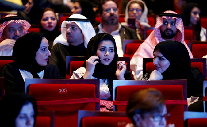 FILE PHOTO: Saudis watch composer Yanni perform at Princess Nourah bint Abdulrahman University in Riyadh, Saudi Arabia, December 3, 2017