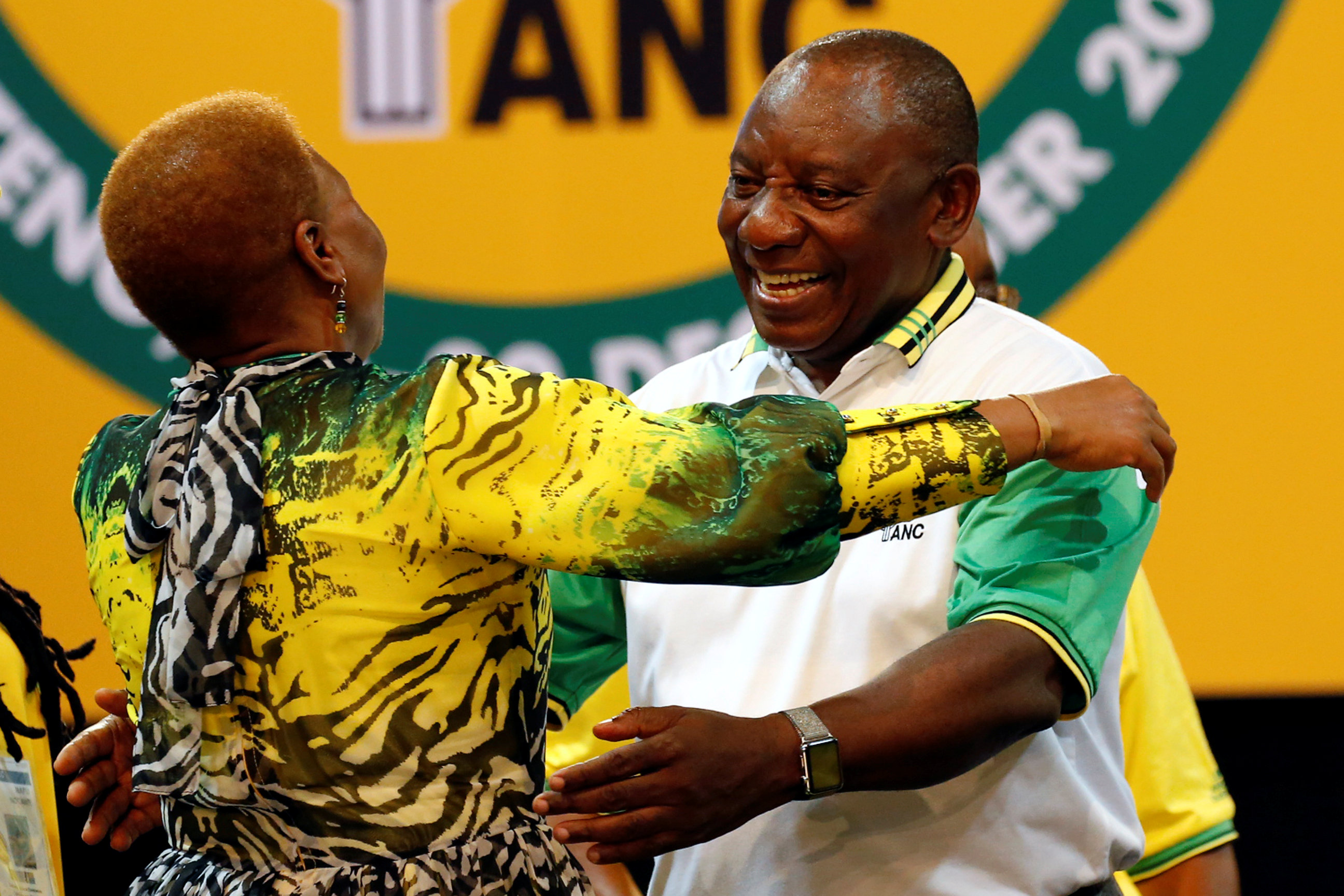 Deputy president of South Africa Cyril Ramaphosa greets an ANC member during the 54th National Conference of the ruling African National Congress, ANC, at the Nasrec Expo Centre in Johannesburg, South Africa December 18, 2017. REUTERS/Siphiwe Sibeko