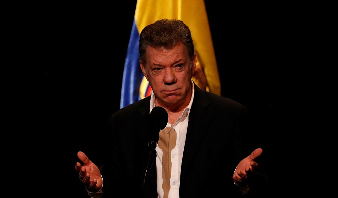 Colombian President Juan Manuel Santos speaks during celebrations of a year of peace signing in Bogota.