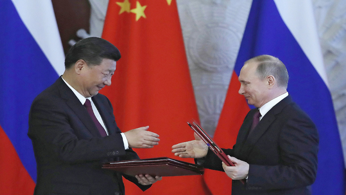 Xi (i) y Putin coincidieron en la importancia de la estrecha relación China-Rusia.