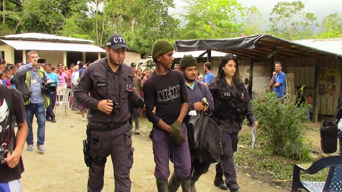 One of German Posso's attackers taken into custody by officials in the town of Community of Peace, Colombia. Dec. 30, 2017.