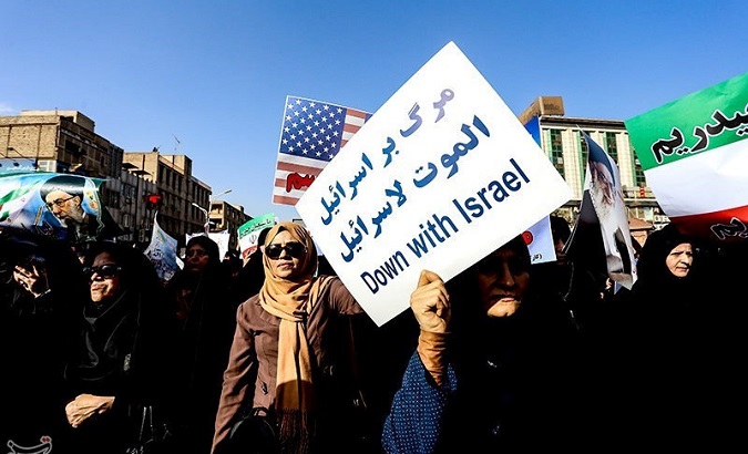 People take part in pro-government rallies, Iran, Jan. 3, 2018.