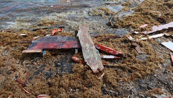 Four Venezuelans die on boat trip made despite travel ban to Curacao US-VENEZUELA-CURACAO Pieces of wood are seen on the shore where bodies of four people were found, after their boat broke apart several miles before reaching Curacao, according to a Venezuelan family member of one of the passengers on board who survived, near Willemstad Pieces of wood are seen on the shore where bodies of four people were found, after their boat broke apart several miles before reaching Curacao.