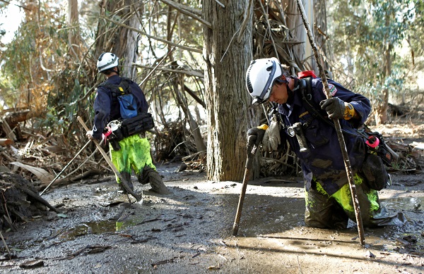 Firefighters Brandon Bennewate (R) and Billy Wren dig through mud searching for bodies. The cause of death for most of the victims will be listed as multiple traumatic injuries resulting from flash floods with mudslides, the Santa Barbara Sheriff's office said Thursday. The dead ranged in age from 3 to 89.