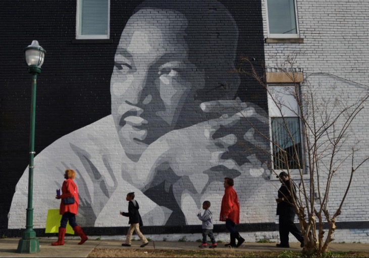 People gather to march in the annual parade down MLK Boulevard to honor Martin Luther King, in Chattanooga, Tennessee. REUTERS/Billy Weeks.