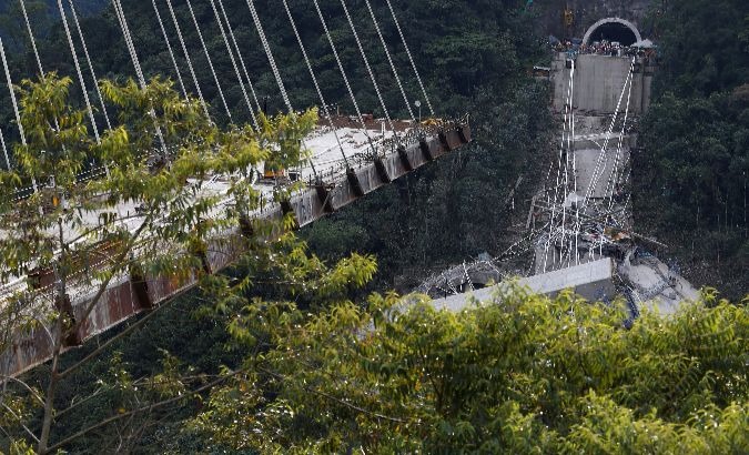 View of a bridge under construction that collapsed leaving dead and injured workers in Chirajara near Bogota, Colombia.