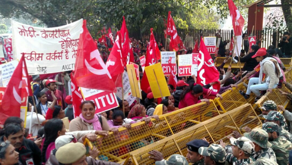 Protesters take part in the nation-wide strike against the Modi government's austerity measures. 