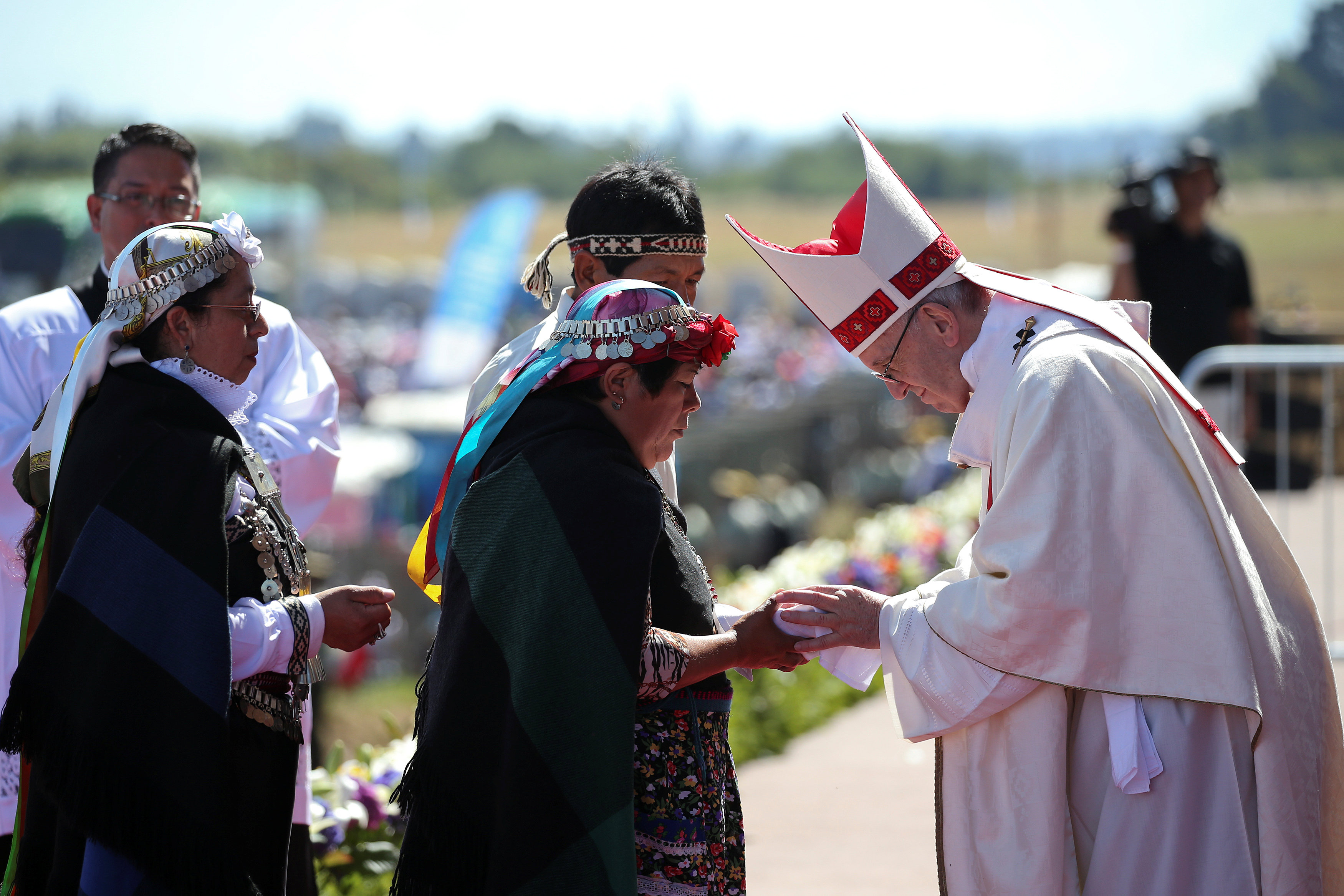 Mapuche people meet Pope Francis during a mass at the Maquehue Temuco Air Force base in Temuco, Chile, January 17.