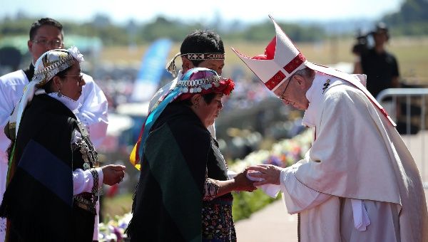 Mapuche people meet Pope Francis during a mass at the Maquehue Temuco Air Force base in Temuco, Chile, January 17. 