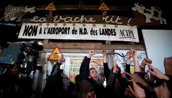 Residents of the zoned ZAD react after the French government's announcement to abandon the Grand Ouest Airport (AGO) project in Notre-Dame-des-Landes, near Nantes, France, January 17, 2018.