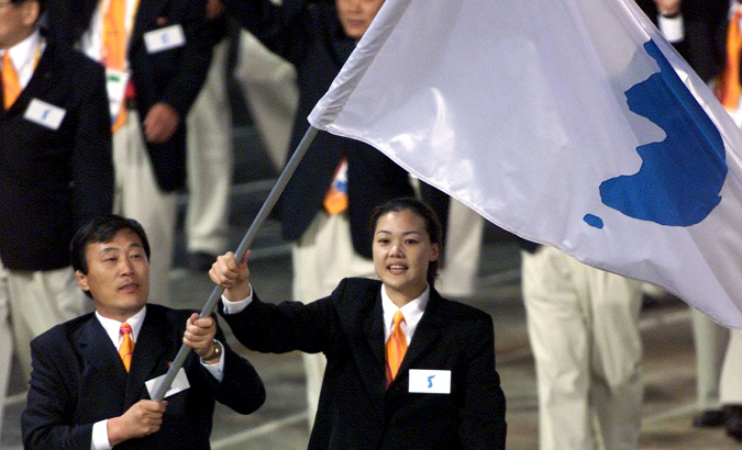 North and South Korean sport's representatives carry unification flag at the opening ceremony of the 2000 Olympic Games, in Sydney.