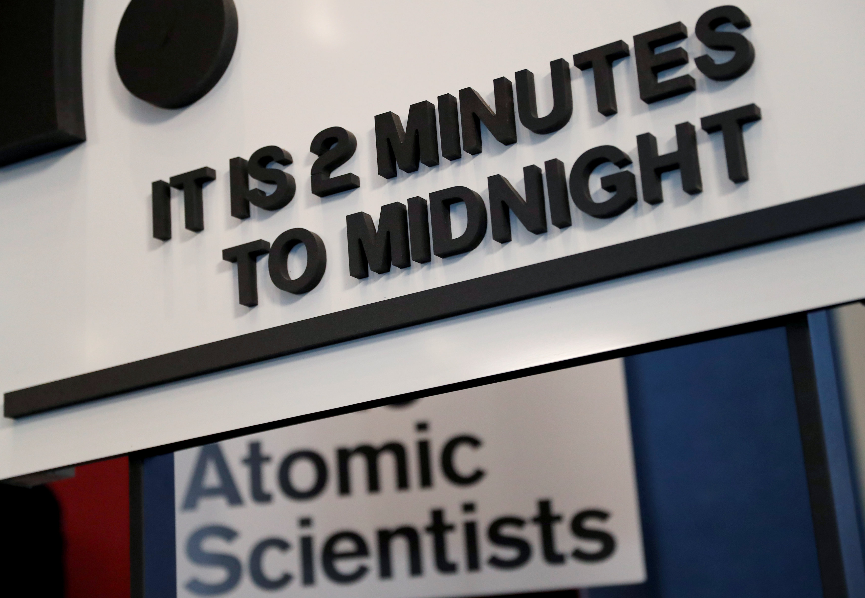 The updated time designation is visible underneath the ‘Doomsday Clock’ during a news conference.” in Washington, U.S. January 25, 2018.