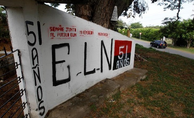 A graffiti, of rebel group Army Liberation National (ELN) is seen at the entrance of the cemetery of El Palo, Cauca, Colombia.