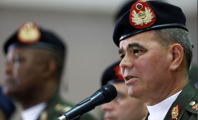 Flanked by military top brass, Venezuelan Defense Minister Vladimir Padrino rejects U.S. threats of a coup to oust President Maduro.