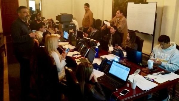 The Foreign Ministry team in Quito preps for the polls.
