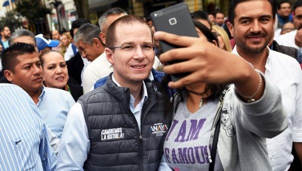 Ricardo Anaya, presidential pre-candidate for the National Action Party (PAN), who leads a left-right coalition, takes a sselfie with a supporter during a rally in Xalapa, Veracruz, Mexico February 10, 2018