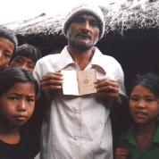 Bhutanese refugees in Beldangi I presenting a Bhutanese passport. It is a legal passport of Bhutan that many Bhutanese Refugees surreptitiously took with themselves when they were forcefully deported from Bhutan. 