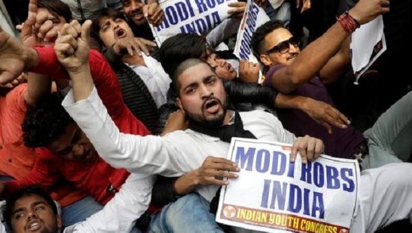 Activists of the youth wing of India's main opposition Congress party shout slogans during a protest against billionaire jeweller Nirav Modi in New Delhi on Feb. 16. 