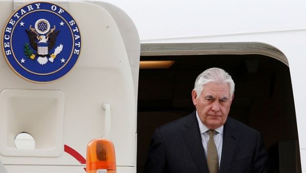 U.S. Secretary of State Rex Tillerson steps off his plane as he arrives at the presidential hangar in Mexico City, Mexico, Feb. 1, 2018. 