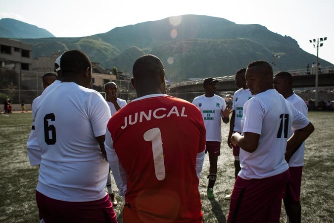 Young soccer players gather before a morning practice. 'Juncal' is a town within the Valley, which sits along the Panamerican highway and along the River Chota