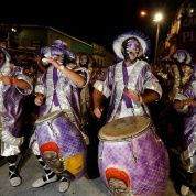 Members of a comparsa, an Uruguayan carnival group, participate in the Llamadas parade, a street fiesta with a traditional Afro-Uruguayan roots, in Montevideo, Uruguay February 10, 2018. 