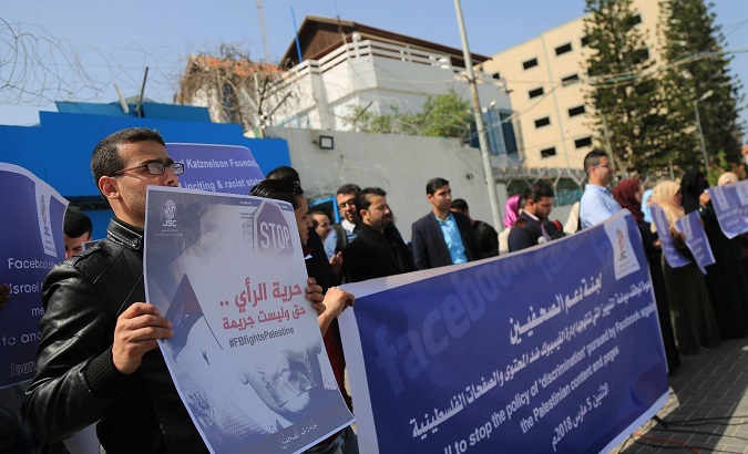 Palestinian journalists hold a protest against recent Facebook censorship of Palestinian accounts in Gaza City.