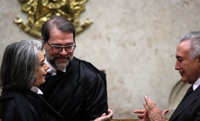 Brazilian Supreme Court of Justice President Carmen Lucia (L) greets Brazilian President Michel Temer (R).