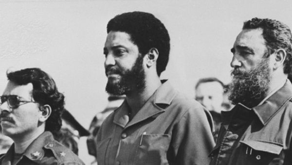 Grenadian revolutionary Maurice Bishop, center, with Cuba's Fidel Castro, right.