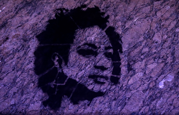 Stencil art depicting murdered Rio de Janeiro city councilor Marielle Franco on the wall of the city council chamber.
