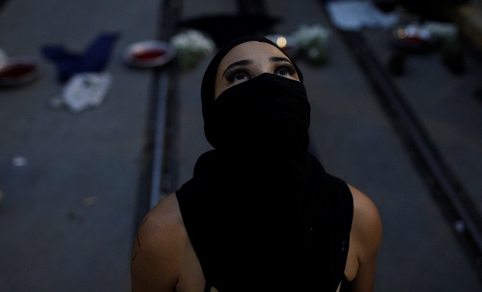 Brazilian woman during a protest against the murder of councilwoman and activist Marielle Franco.