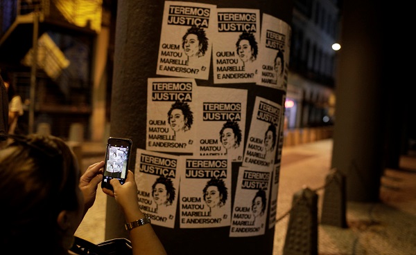 Protest placards at a rally against the shooting of city councilor and activist Marielle Franco in Rio de Janeiro, Brazil.