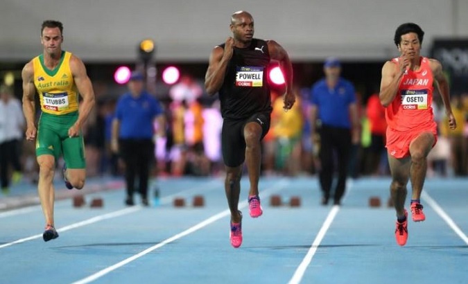 Jamaica's Asafa Powell (C) held the world 100-meter record for three years between 2005 and 2008 at 9.77 and 9.74 seconds.