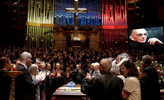 Mourners and members of the National System of Children and Youth Orchestras attend the memorial service of its founder Jose Antonio Abreu in Caracas.