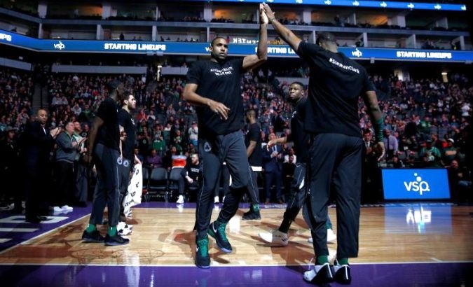 Boston Celtics forward Al Horford is introduced before the start of a game against the Sacramento Kings. Players from both teams wore t-shirts during warmups in honor of Stephon Clark.