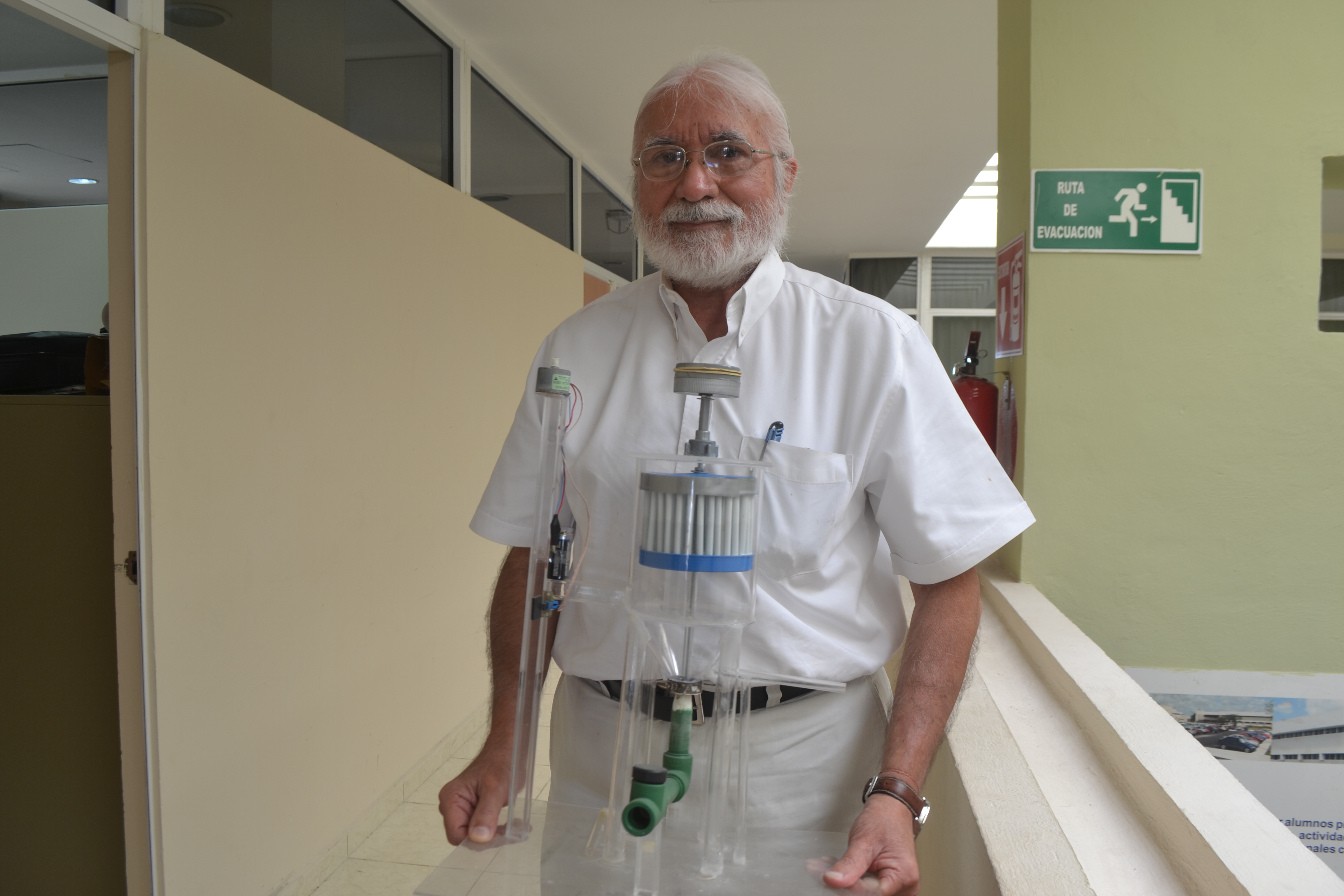 Jorge Lechuga posing with one of his home made desalination systems