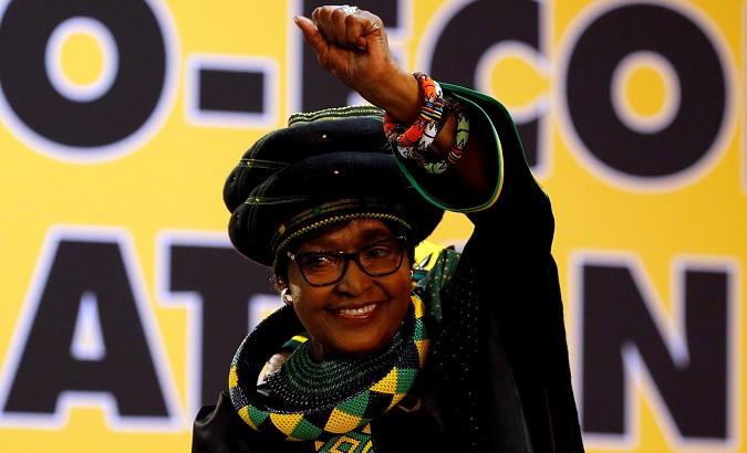 Winnie Madikizela Mandela gestures to supporters at the National Conference of ruling African National Congress in Johannesburg, South Africa Dec.16, 2017.