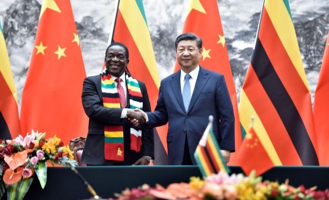 Mnangagwa (L) greets Xi during a state visit, to China, which runs from April 2 to 6.