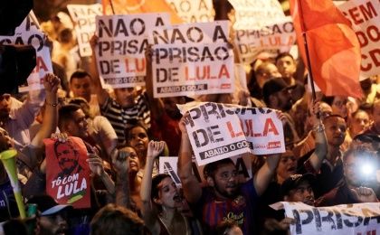 Supporters of former Brazilian President Luiz Inacio Lula da Silva protest against the ordered Lula to turn himself into police. The signs read; 