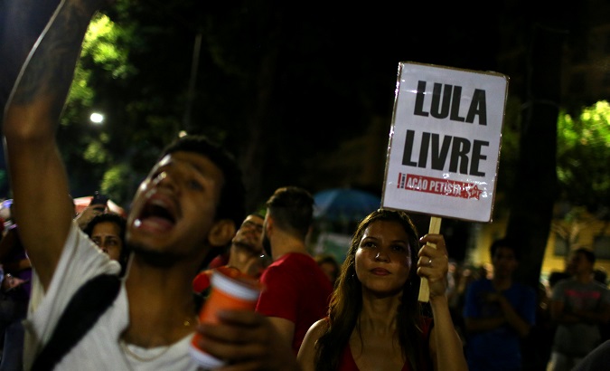 Supporters of former Brazilian President Lula protest against sentencing him to serve a 12-year prison sentence for corruption, in Rio de Janeiro, Brazil April 6, 2018.