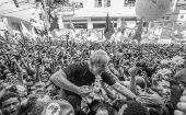 Former Brazilian President Lula is hoisted by supporters after speaking at the ABC Steelworkers Union headquarters.