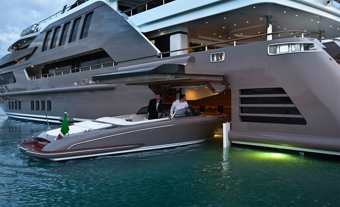 A 196-foot J'ade from CRN comes with a hydraulic-powered hatch that can deploy a smaller but similarly opulent boat.