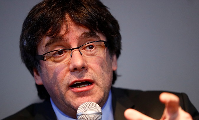 Catalonia's former leader Carles Puigdemont addresses a news conference in Berlin, Germany, April 7, 2018.