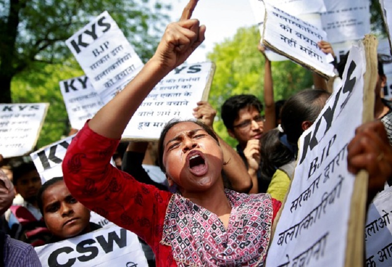 A woman reacts at a protest against the rape of an eight-year-old girl, in Kathua, near Jammu and a teenager in Unnao, Uttar Pradesh state, in New Delhi, India April 12, 2018. 